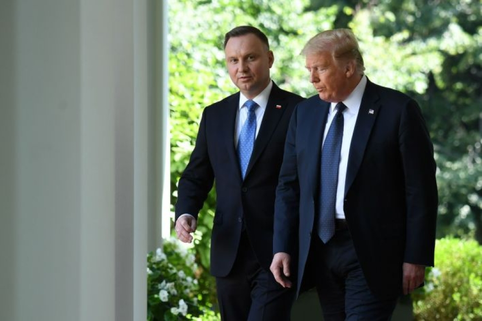 Trump puhui joukkojen tilanteesta yhteisessä mediatilaisuudessa Puolan presidentin Andrzej Dudan kanssa. LEHTIKUVA/AFP